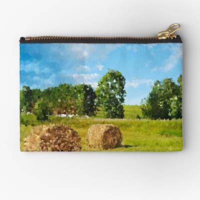 Hay Bales in Grassy Field
