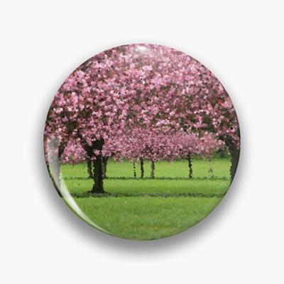 Pink Blossoming Trees Over Green Field